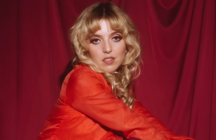 EMEREE has told Contact Music about how she reacted to being one of NME'S top 100 artists to watch in 2025, getting her domestic violence ordeal out of her head with her new single and a future collaboration with Nile Rodgers
