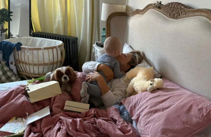 Emily Atack cuddling Barney / Credit: Instagram