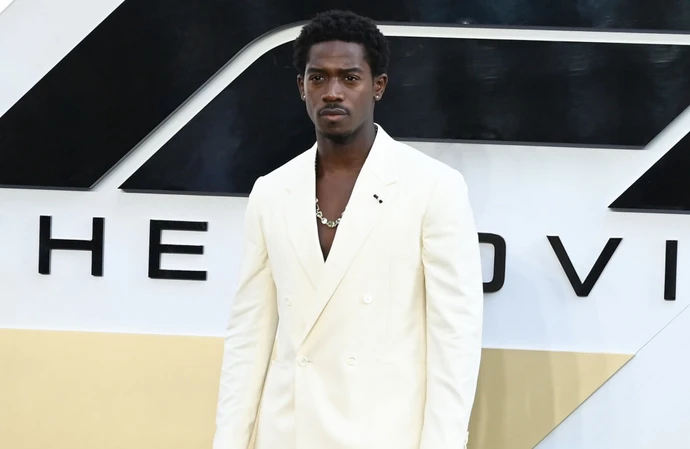 Damson Idris enjoys getting to dress up smartly