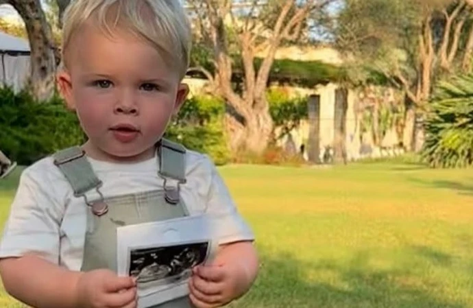 Laura Tott's son Leo announcing her pregnancy / Credit: Instagram @lauratott__