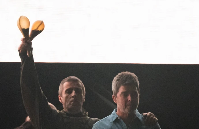 Oasis star Liam Gallagher admitted it was 'good to be back' as he and his estranged brother Noel took to the stage for the first time in 16 years
