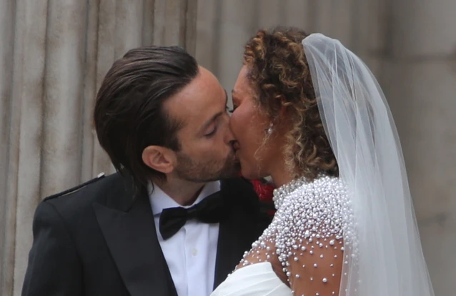 Mel B didn't expect any of the Spice Girls to attend her double wedding
