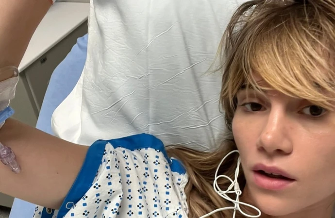 Suki Waterhouse suffered a hernia because her pants were 'so tight'