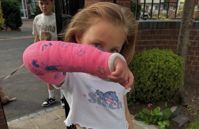 Adam Thomas' daughter Elsie showing her cast / Credit: Instagram