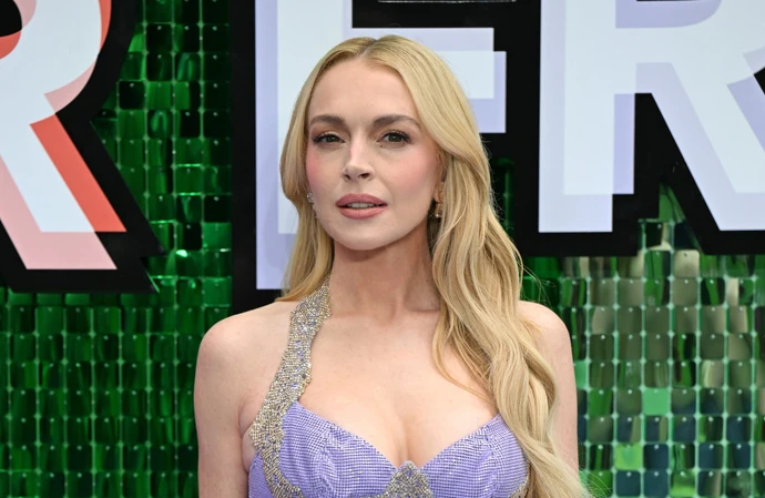 Lindsay Lohan is learning how to juggle work with motherhood