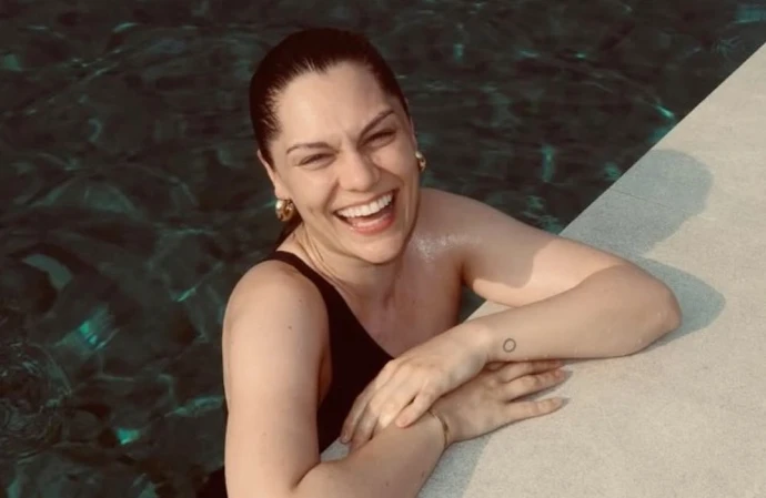 Jessie J has shared joyous photographs of her holiday in Majorca two months after undergoing a mastectomy as part of her treatment for breast cancer