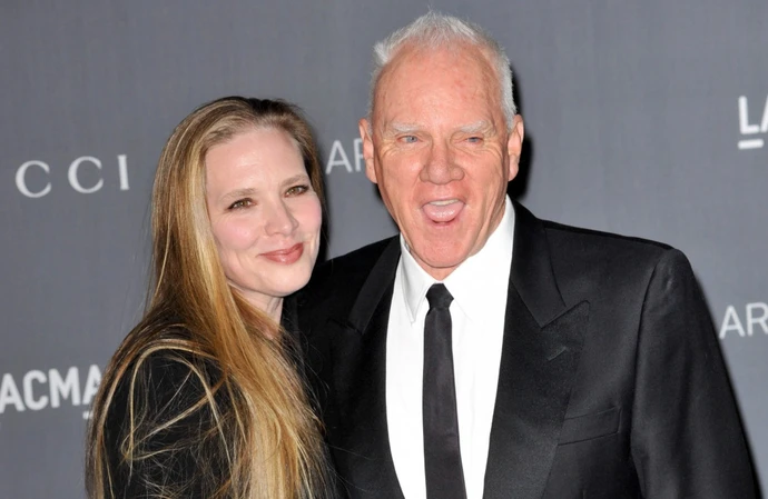 Kelley Kuhr and Malcolm McDowell