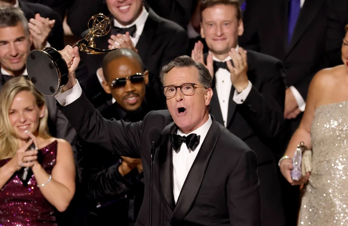 Stephen Colbert celebrates his Emmy win