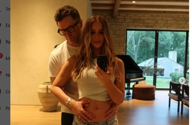 Bobby Bones and Caitlin Parker are expecting their first child