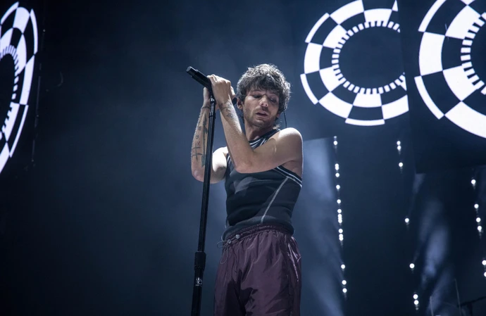 Louis Tomlinson will release his third album in January