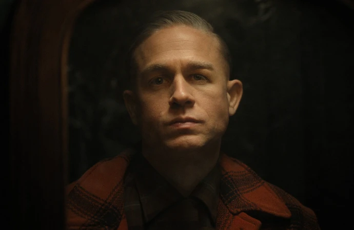 Charlie Hunnam as Ed Gein in Monster: The Ed Gein Story