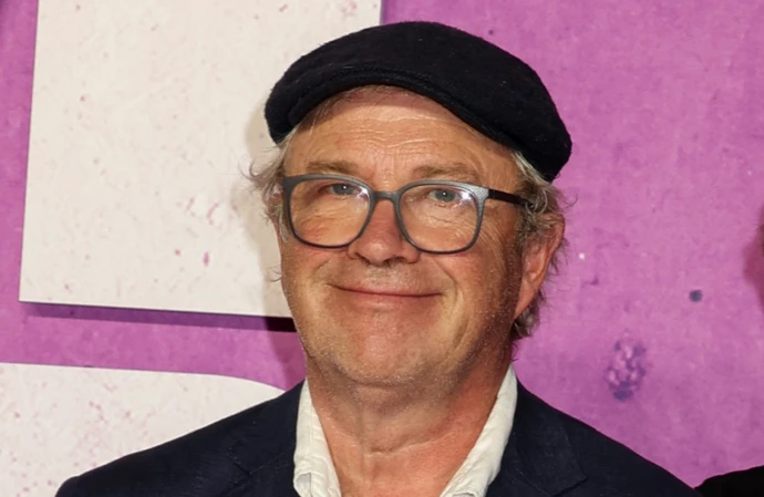 Harry Enfield has revealed he shared a friendship with comedy legend Peter Cook up until his death in January 1995
