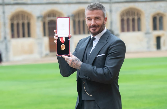 Sir David Beckham has received his knighthood from King Charles