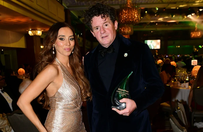 Una Healy gave an Irish Post Award to restaurateur Oisin Rogers