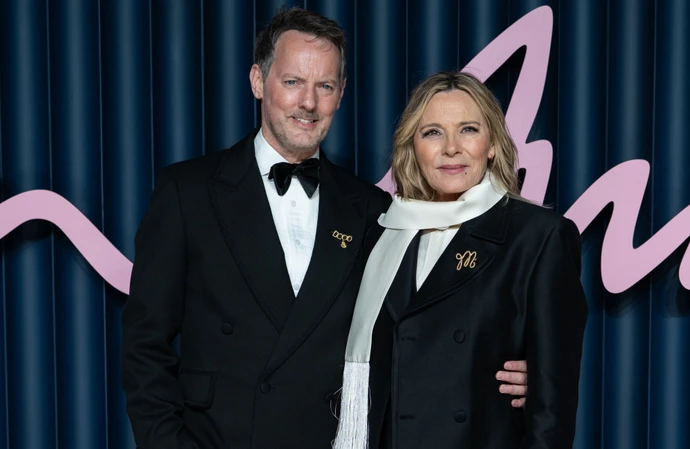 Kim Cattrall has married her partner Russell Thomas in London