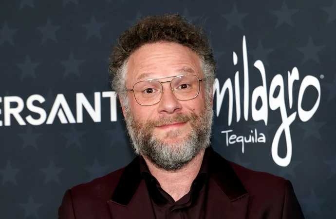 Seth Rogen with his Critics Choice Award