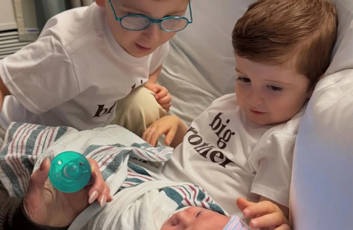 Meghan Trainor's sons Riley and Barry bonding with their newborn sister, Mikey / © Instagram