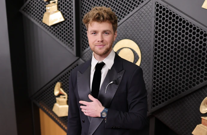 Alex Warren on the red carpet at the Grammys