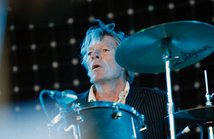 Andrew Ranken performing with The Pogues at Wollaton Park in 2009