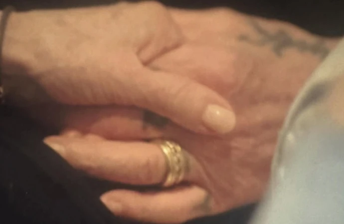 Sharon Osbourne holding Ozzy's Osbourne's hand / © Instagram