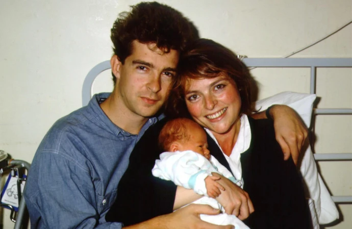 John Leach, Janet Ellis, and their son Jackson in 1987