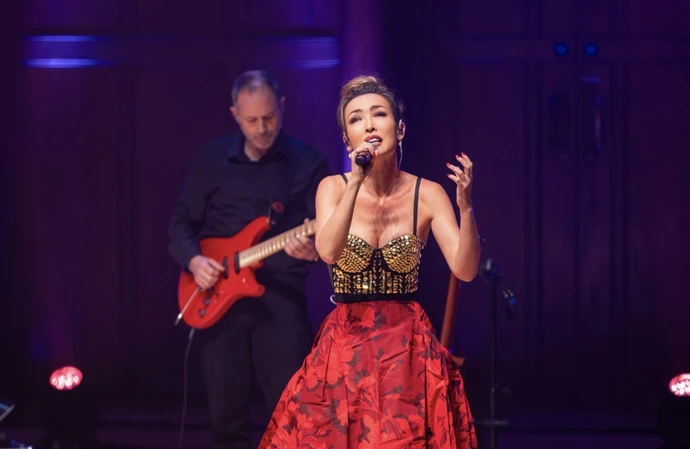 Qymira's costume hides a secret