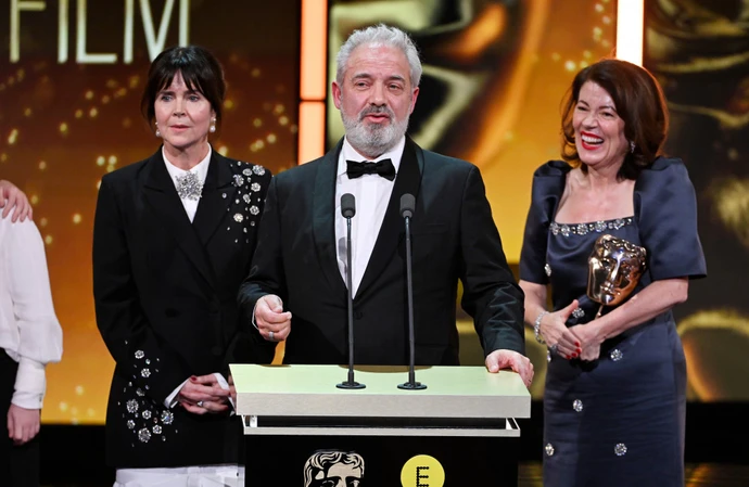 Liza Marshall, Sir Sam Mendes and Dame Pippa Harris accepting the Outstanding British Film gong at the 2026 BAFTA Film Awards