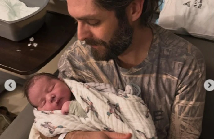 Thomas Rhett and his baby son (c) Instagram