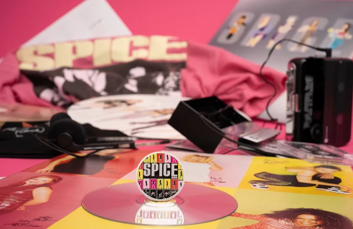 The Spice Girls are celebrating a coin released in their honour