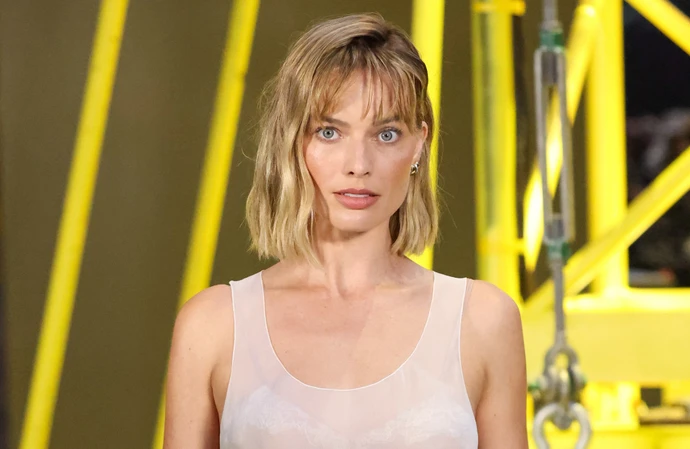 Margot Robbie takes on Kylie Minogue in a new Chanel advert