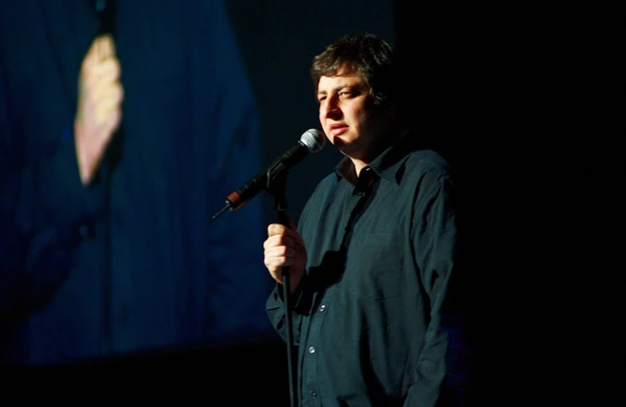 Bob's Burgers star Eugene Mirman was rushed to hospital after being pulled from a burning car