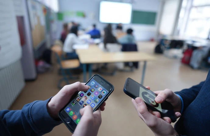 Smartphones are set to be banned from schools in England