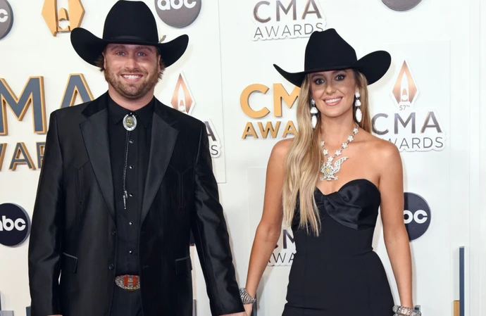 Couple Devlin "Duck" Hodges and Lainey Wilson