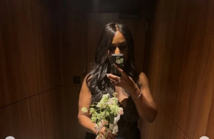 Ashley Smith caught Taylor Swift's bouquet (c) Instagram