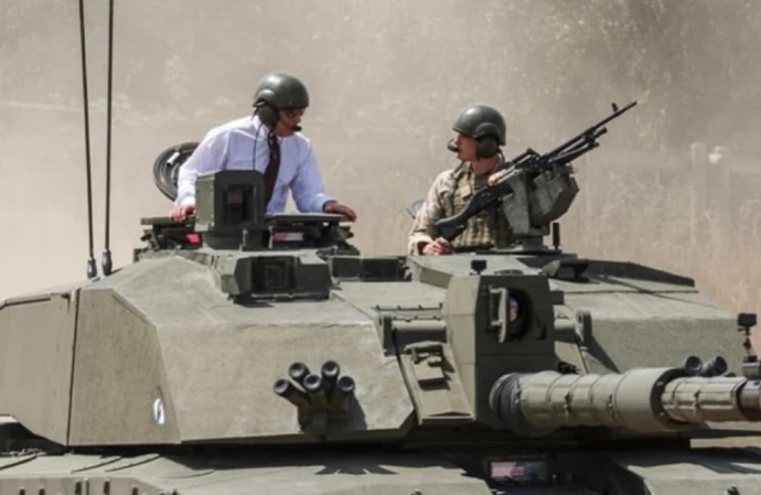 King Charles swapped royal ceremony for military hardware as he climbed aboard a Challenger tank during an engagement with the Royal Tank Regiment in Dorset