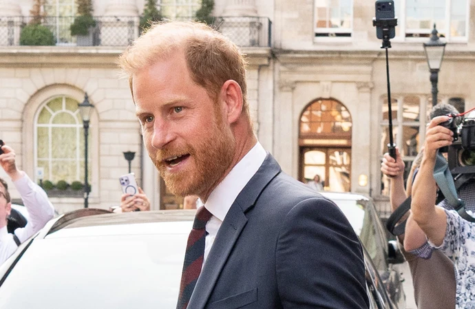 Prince Harry has been accused by a journalist of placing what she believed was a white pill on her tongue during the early days of their friendship