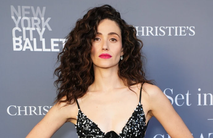 Emmy Rossum wanted to finish watching the game
