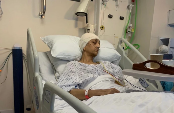 Former Strictly Come Dancing contestant Trishna Bharadia lying in her hospital bed / © Instagram