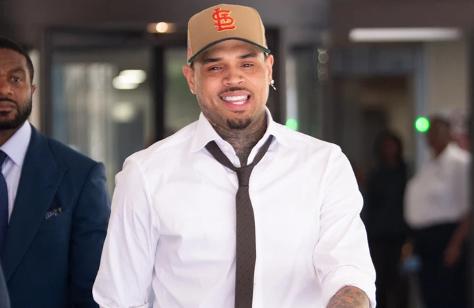 Chris Brown attends the hearing at Southwark Crown Court