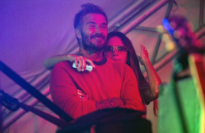 David and Victoria Beckham jet back from Amalfi Coast to watch Cruz's Reading Festival debut; Brooklyn reportedly snubs gig