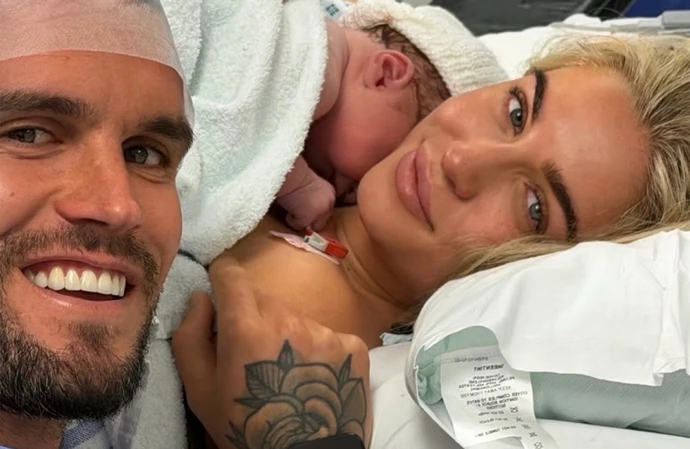Gaz Beadle and Maia Ellen with newborn / © Instagram