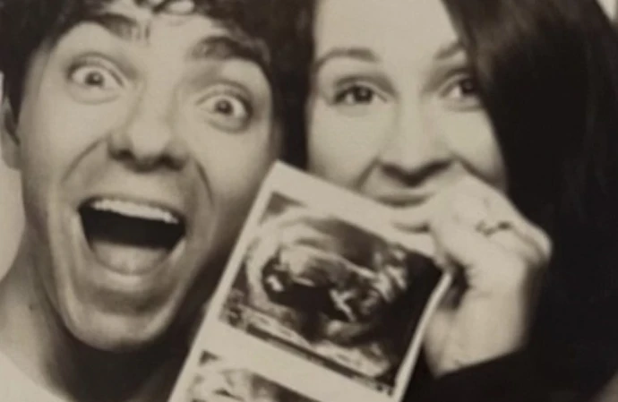 Nathan Sykes and Charlotte with their ultrasound strip