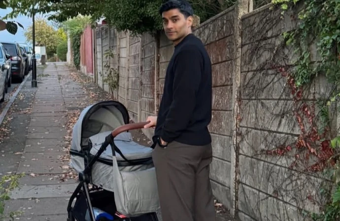 Silent Witness actor Trevor Kaneswaran pushing a pram outside / © Instagram