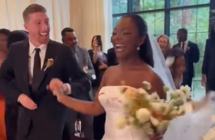 Caleb Moore Freundlich and Kibriyaa Morgan on their wedding day / © Instagram