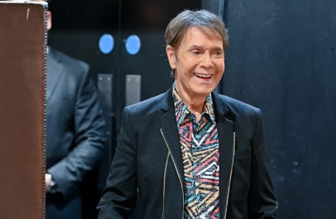 Sir Cliff Richard celebrated his 86th birthday with an afternoon tea party at a luxury London hotel, raising a glass with friends and fans as he marked the occasion with cake, new music and a flamboyant outfit